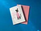 Greeting card with a dog illustration and text on a blue background