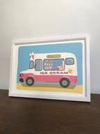A framed illustration of a pink and white ice cream truck on a light blue background. The truck has the words 'Delicious' and 'Ice Cream' on it.  The ice cream truck is surrounded by a yellow sandy beach. The illustration is in a white frame. The image is a whimsical and colorful depiction of a classic summer treat.