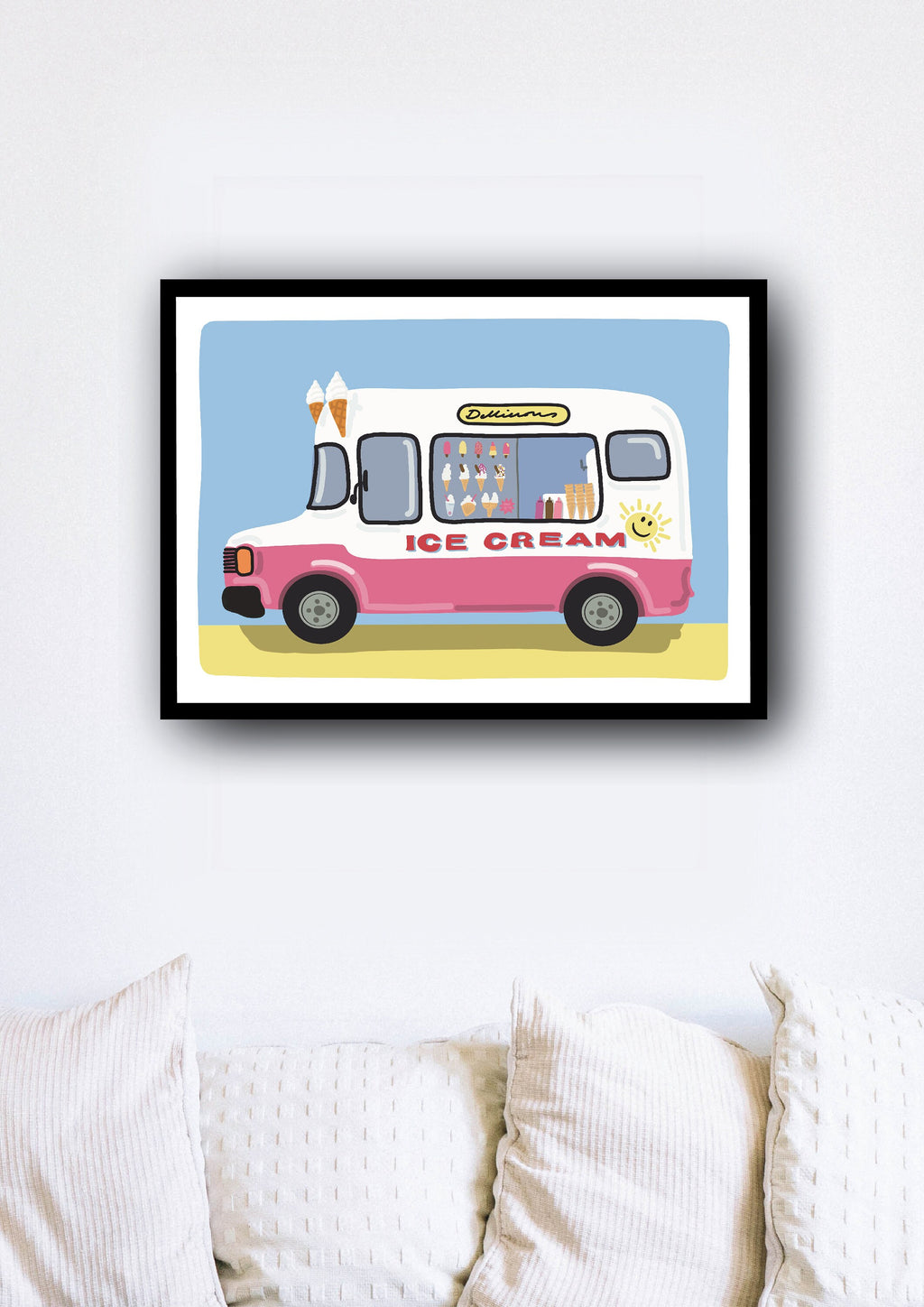 A framed illustration of a pink ice cream truck on a light blue background. The truck has a white roof and windows displaying various ice cream flavors. The words 'Delicious' and 'Ice Cream' are prominently displayed on the truck. Two ice cream cones are shown on top of the truck. The sun is depicted on the side of the truck. The overall style is playful and whimsical, suitable for children's decor.